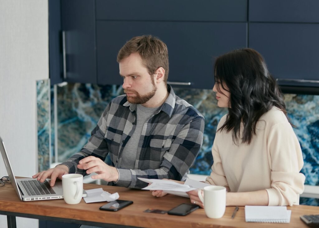 boy and girl working on laptop 