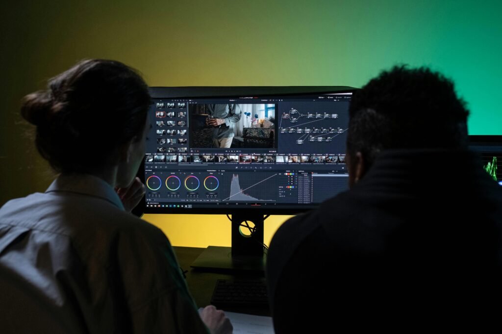 editors editing video on computer
