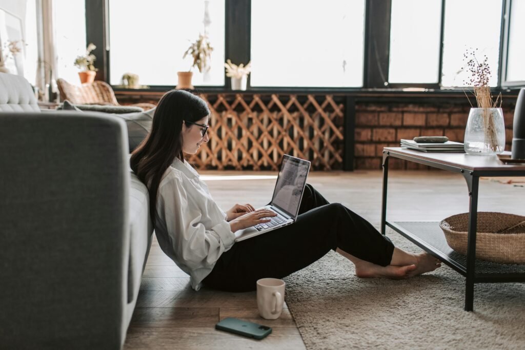 girl doing work on laptop as part time job