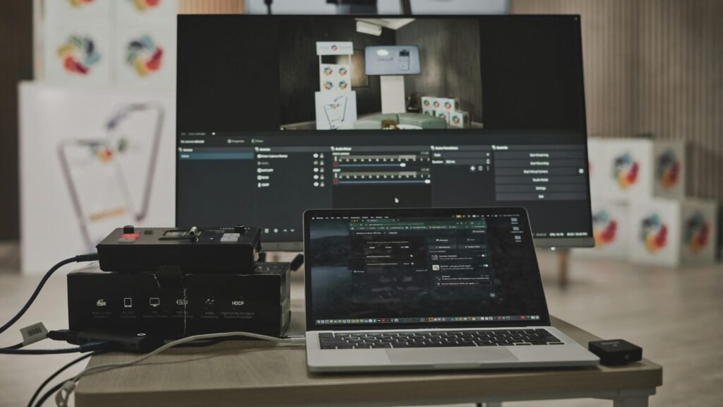 video editing software open in laptop and computer