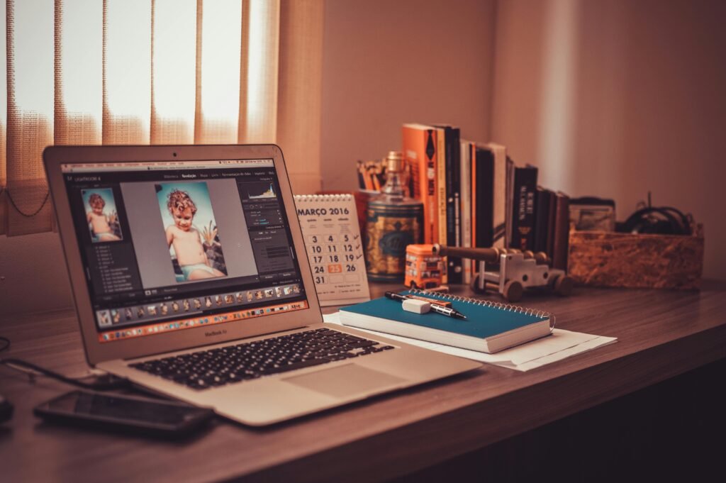 laptop open with editing application