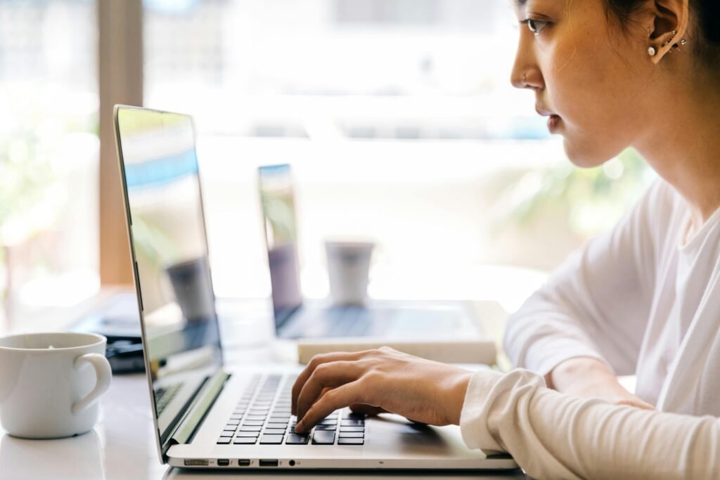 SEO consultant working on laptop