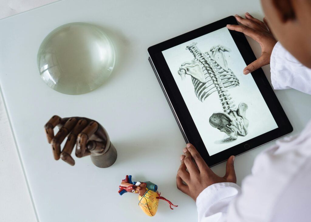 student studying 3d model from ipad